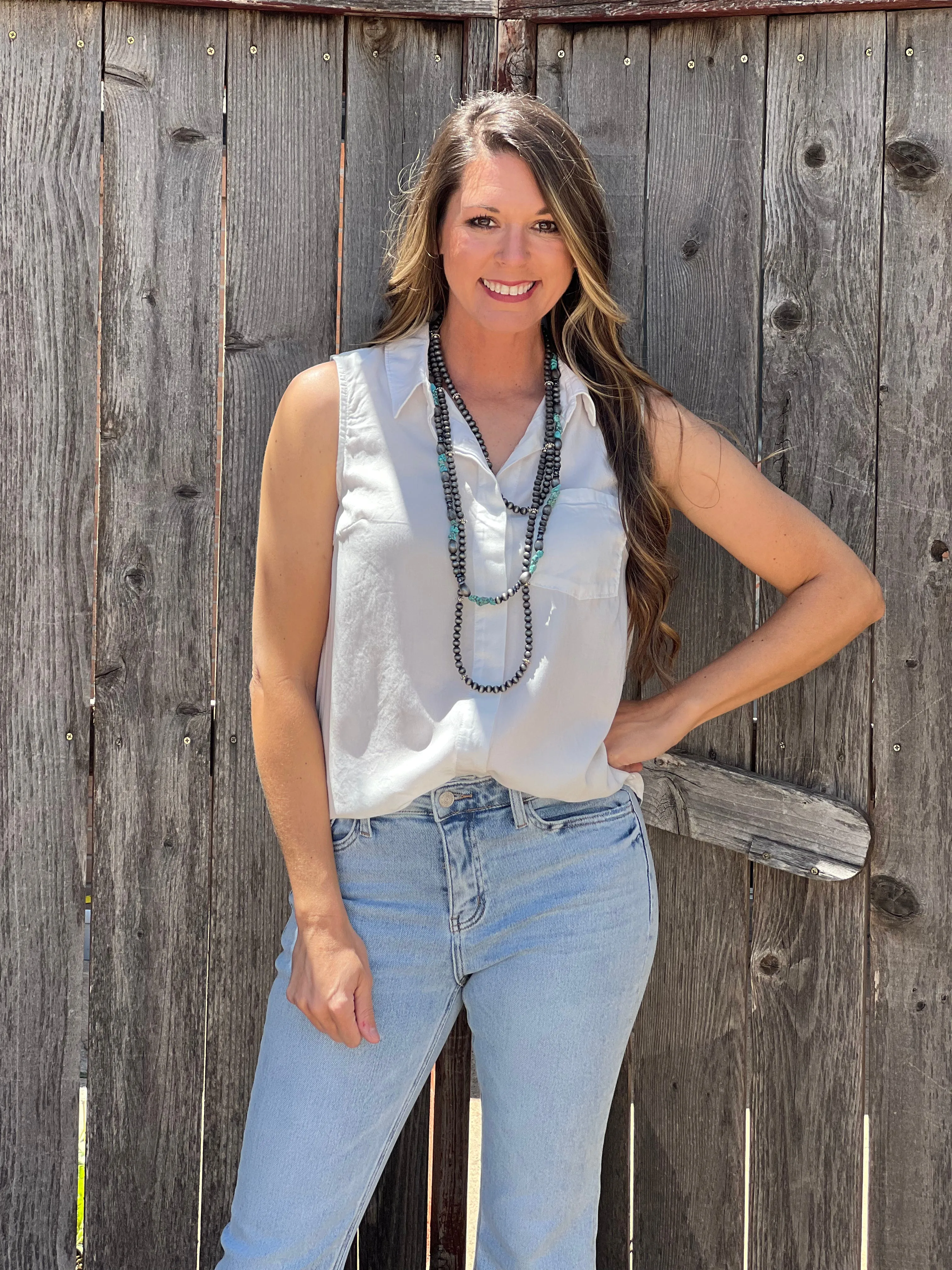 Daisy White Sleeveless Button Down Blouse